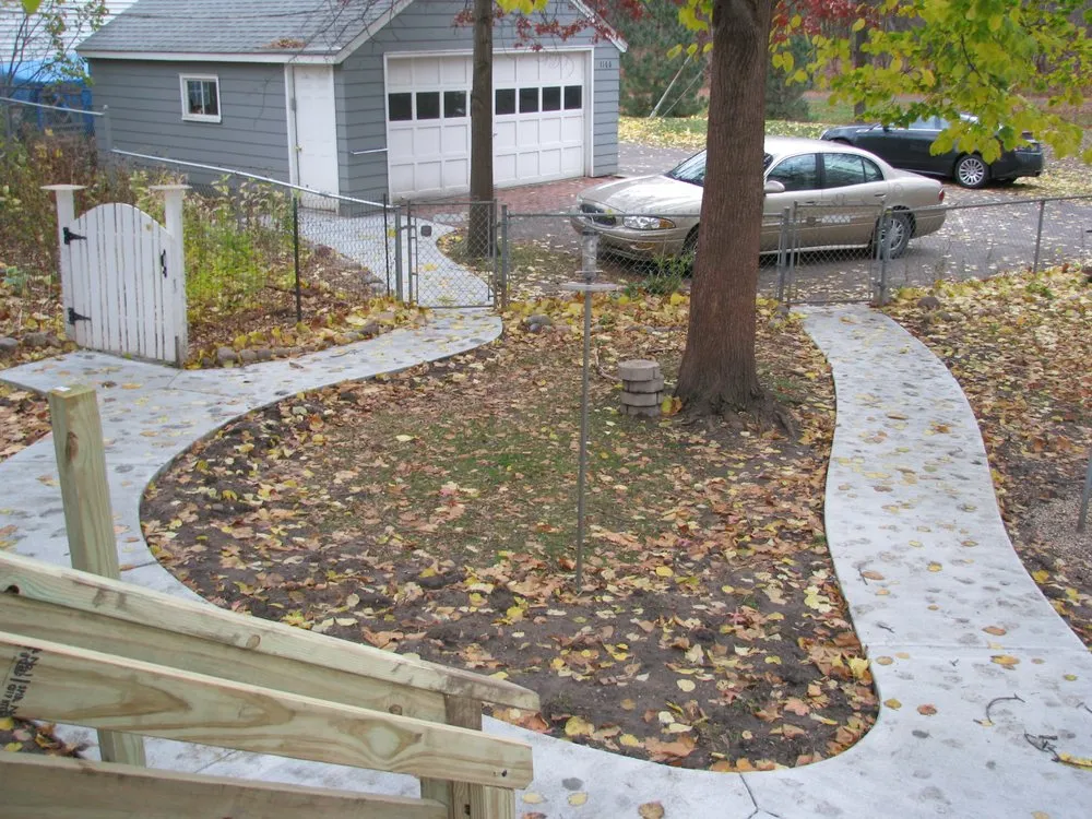 Custom outdoor landscaping with custom design in Saint Paul, MN by 1st Concrete Snow & Lawn