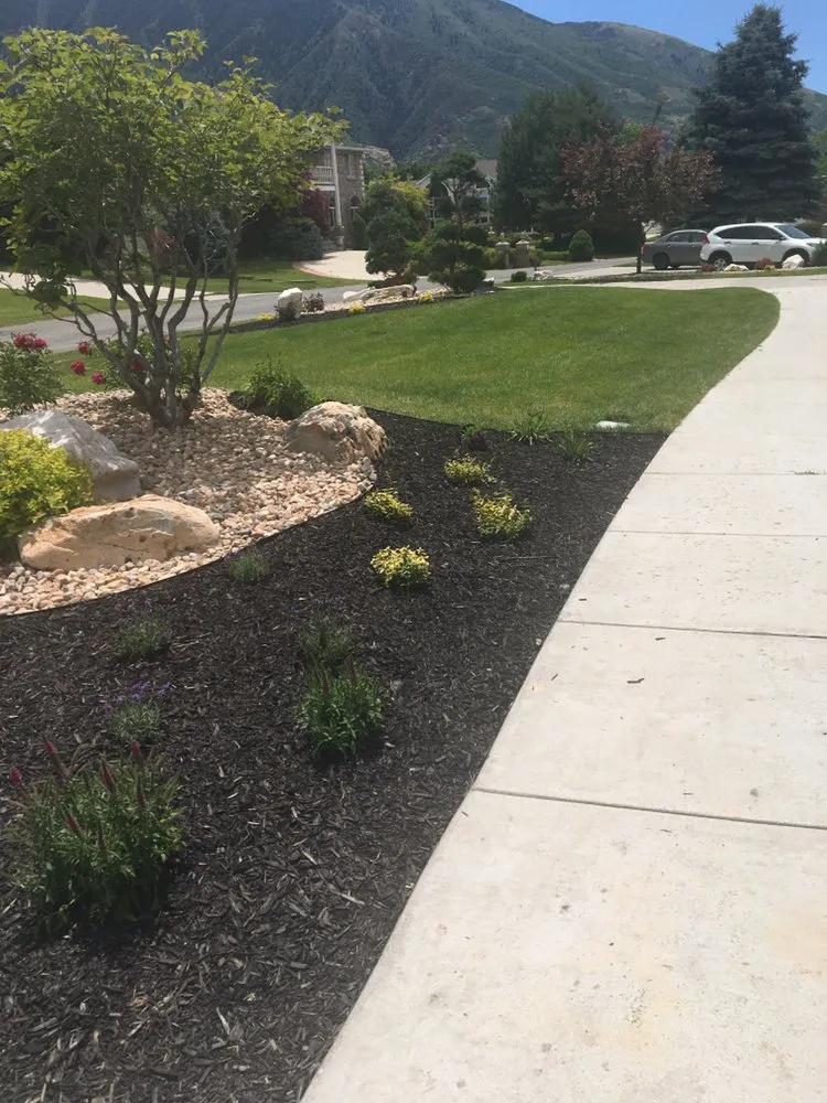 Affordable lawn mowing service in West Valley City, UT by 2 Green Diamonds