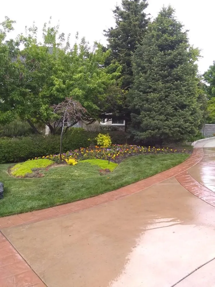 Affordable lawn care service experts serving West Valley City, UT - 2 Green Diamonds