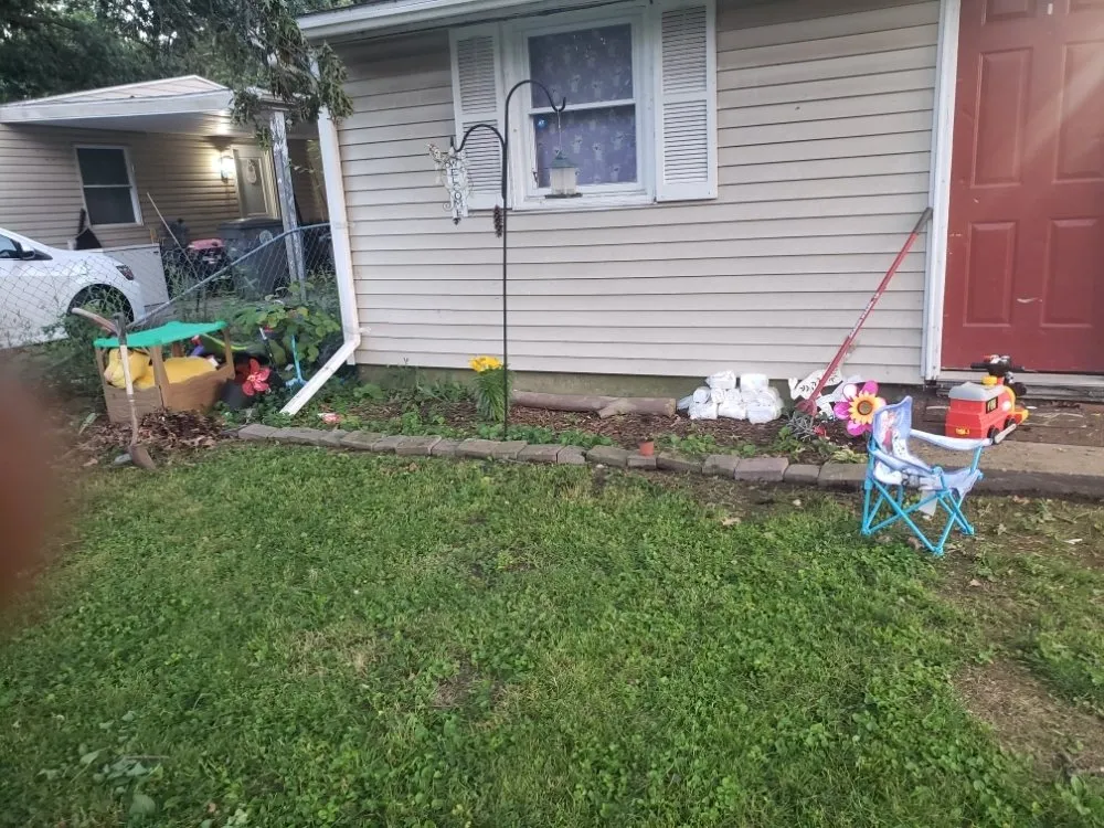 Expert yard maintenance in Evansville, IN by 2Dudes 1Chick Lawn Services