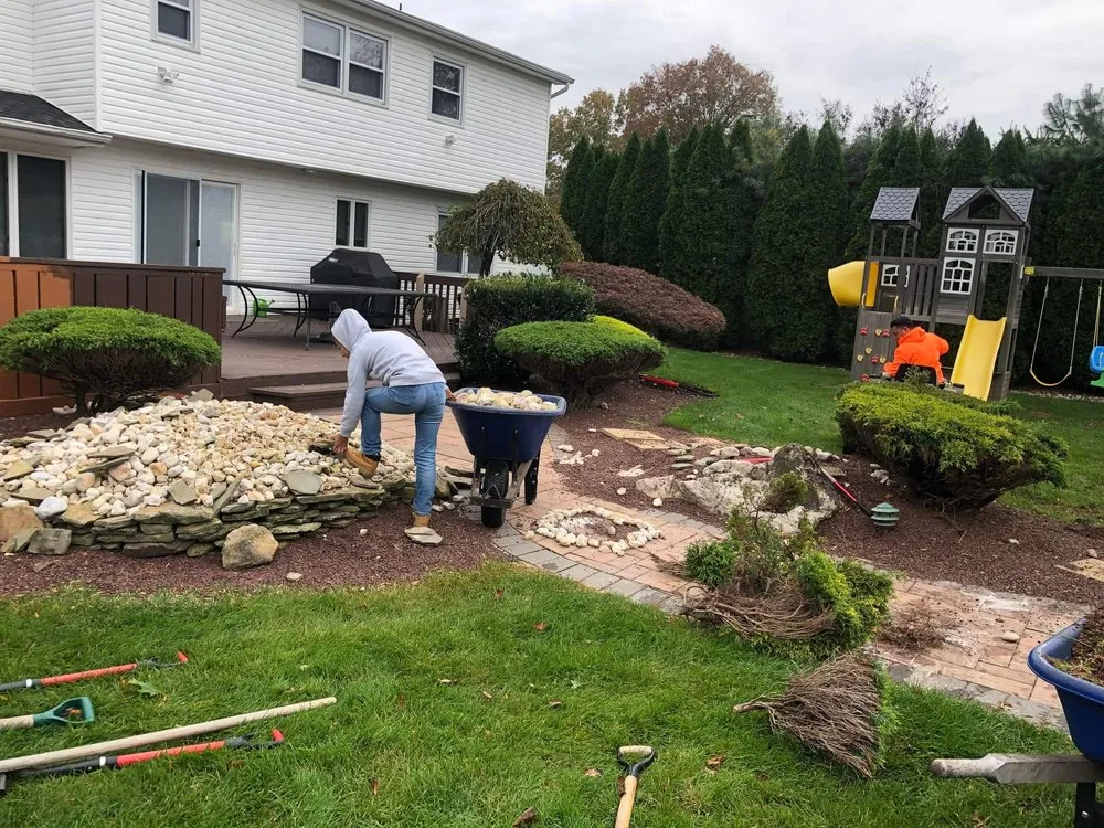 Expert outdoor landscaping with custom design in Freehold, NJ by 3 Brothers Lawn and Landscaping