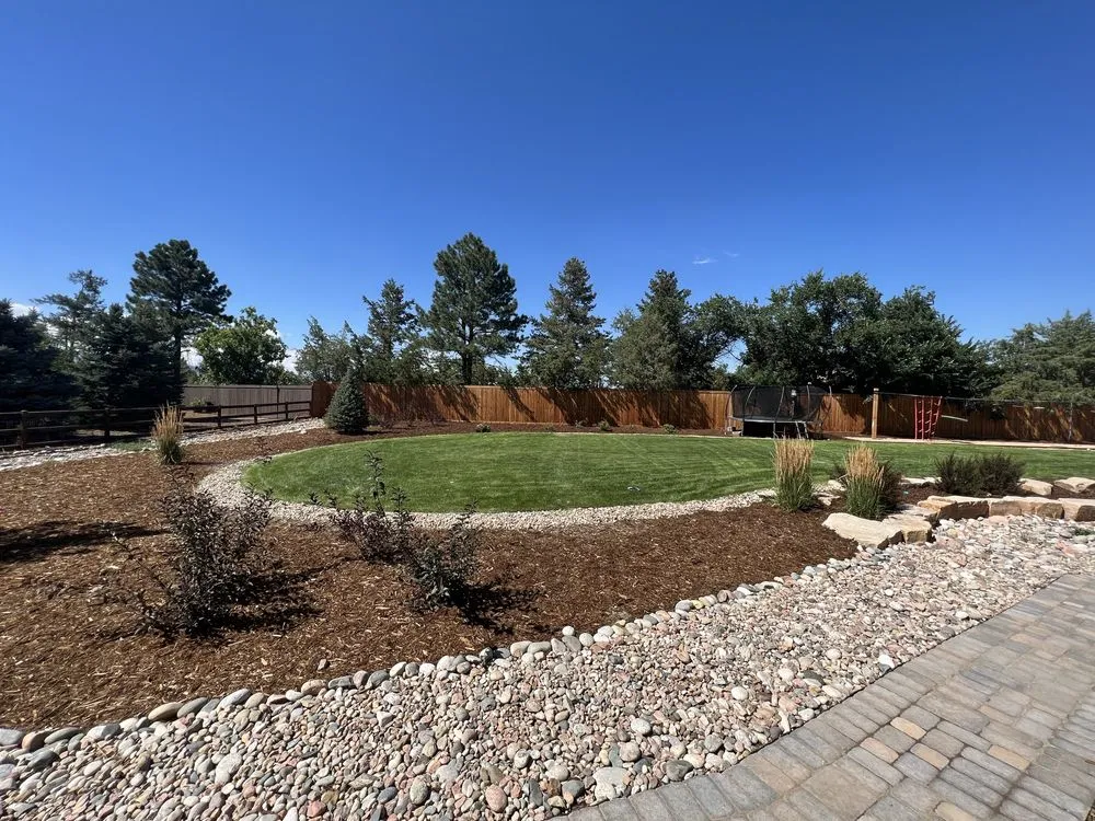 Custom yard cleanup service for residential properties in Denver, CO by 3A Lawn Care