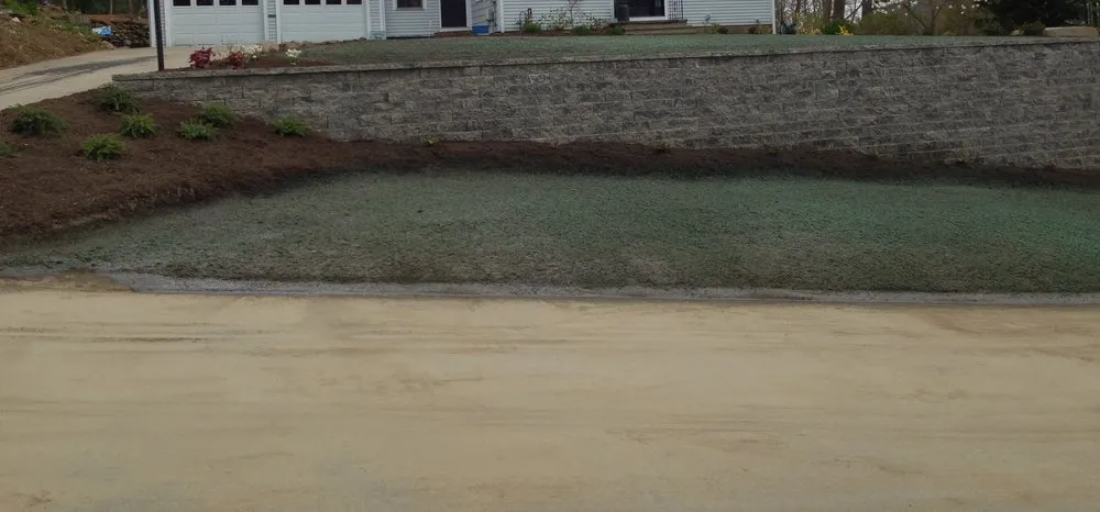 Affordable yard cleanup service for outdoor upgrades in East Greenwich, RI by 3M Landscape Construction