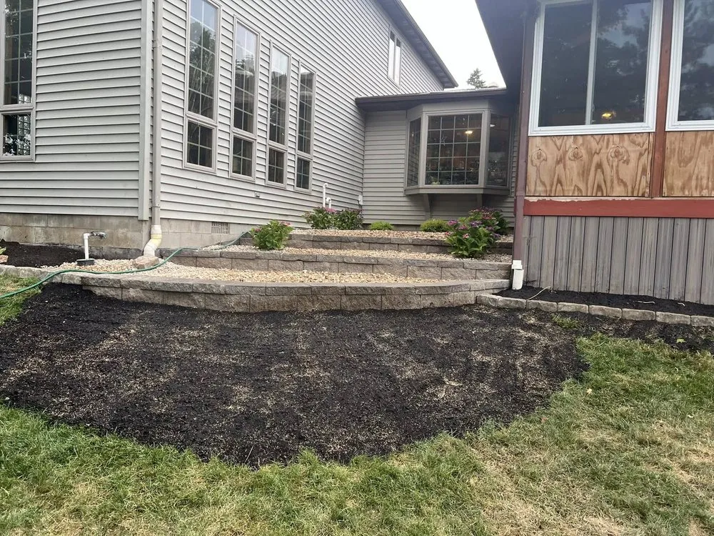 Custom yard cleanup service with custom design across Monroeville, OH - 4 County Lawncare