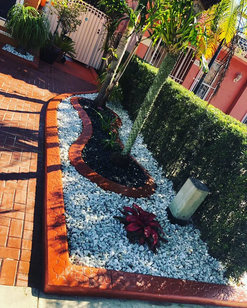 Expert yard cleanup service for residential properties in Miami, FL by 5 Star Borders & Landscape