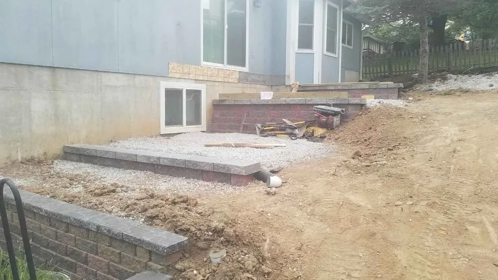 Custom garden landscaping with custom design in Saint Peters, MO by A & E Concrete And Retaining Walls