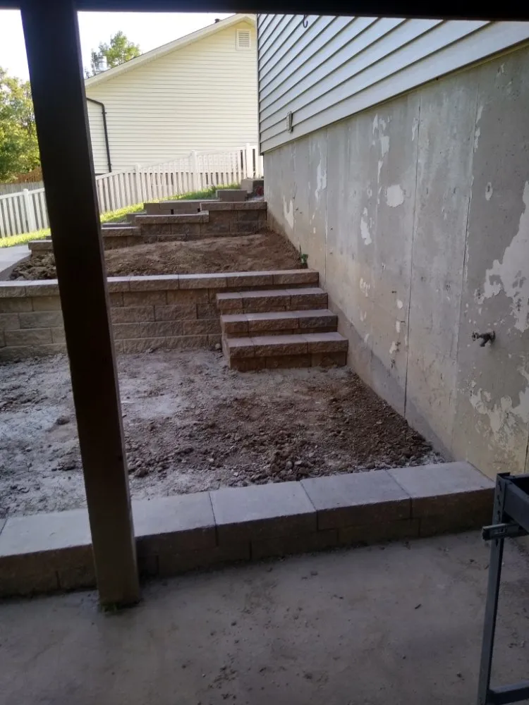 Custom landscape installation in Saint Peters, MO - A & E Concrete And Retaining Walls