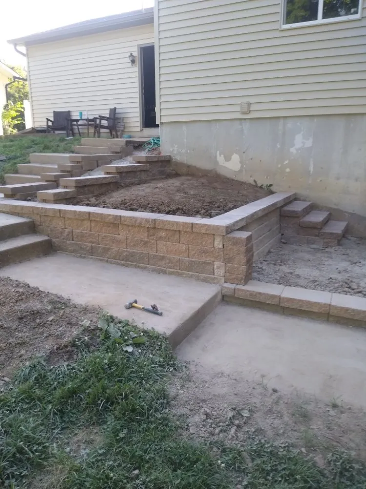 Affordable yard cleanup service for residential properties in Saint Peters, MO by A & E Concrete And Retaining Walls