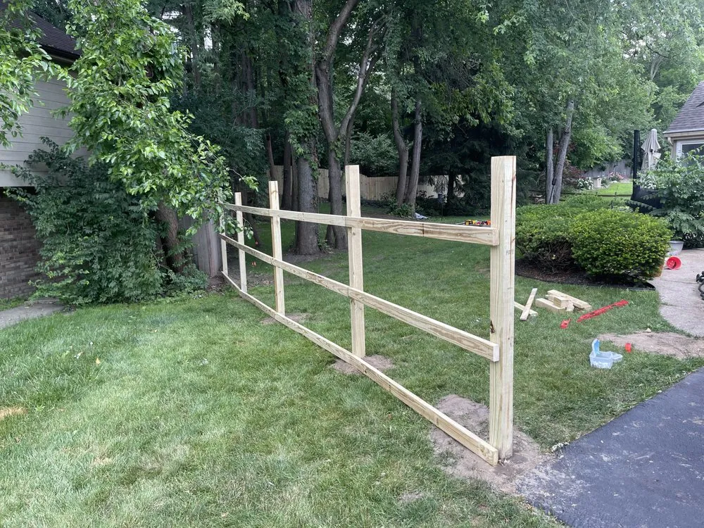 Custom landscape design with custom design in Adrian, MI by A & J Fencing Repair