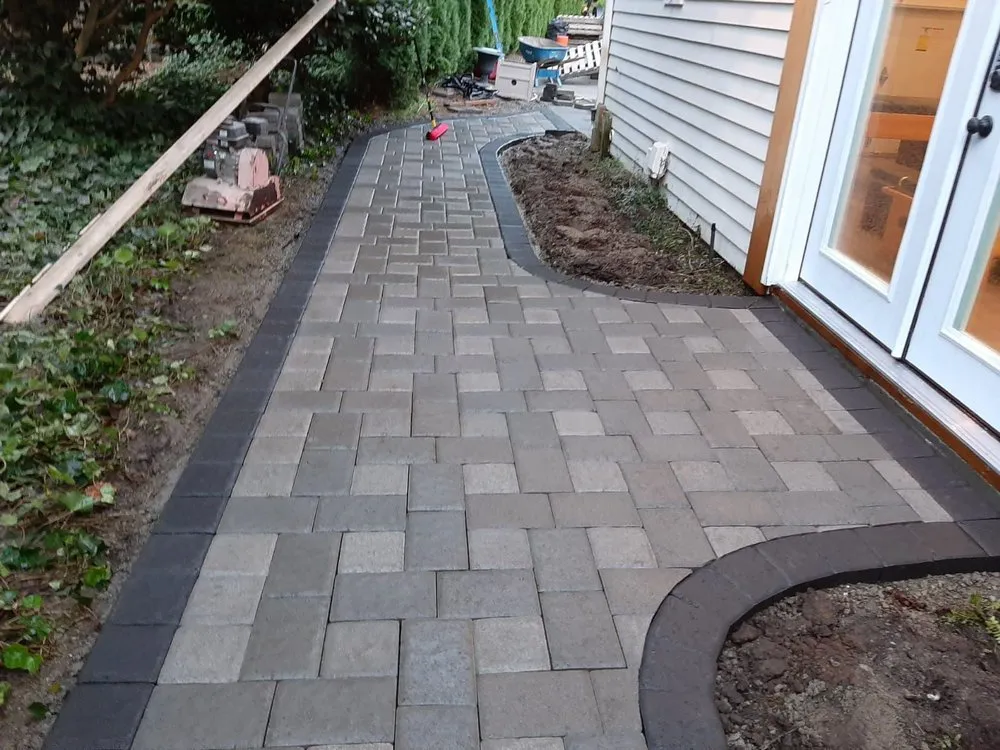 Reliable lawn care service for beautiful yards across Belfair, WA - A & J Hardscape Paver