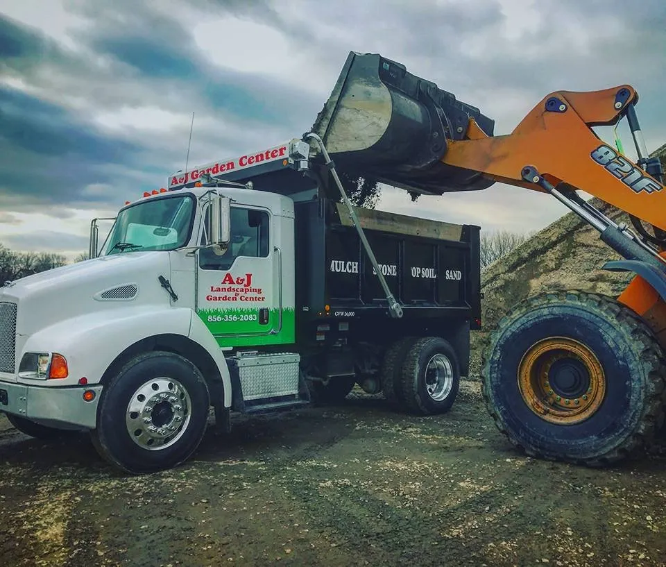 Custom yard cleanup service for beautiful yards in Pennsauken, NJ by A & J Landscape Supply and Garden Center