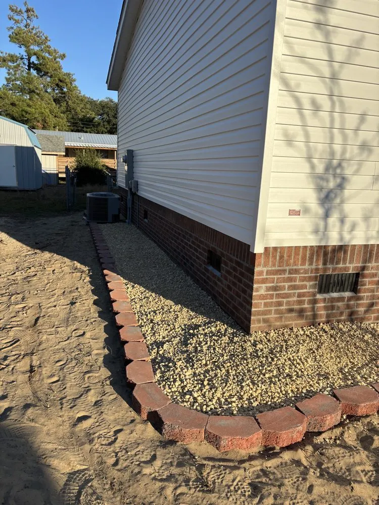 Top-rated garden landscaping with custom design across Ash, NC - A & J Lawn Care & Landscaping