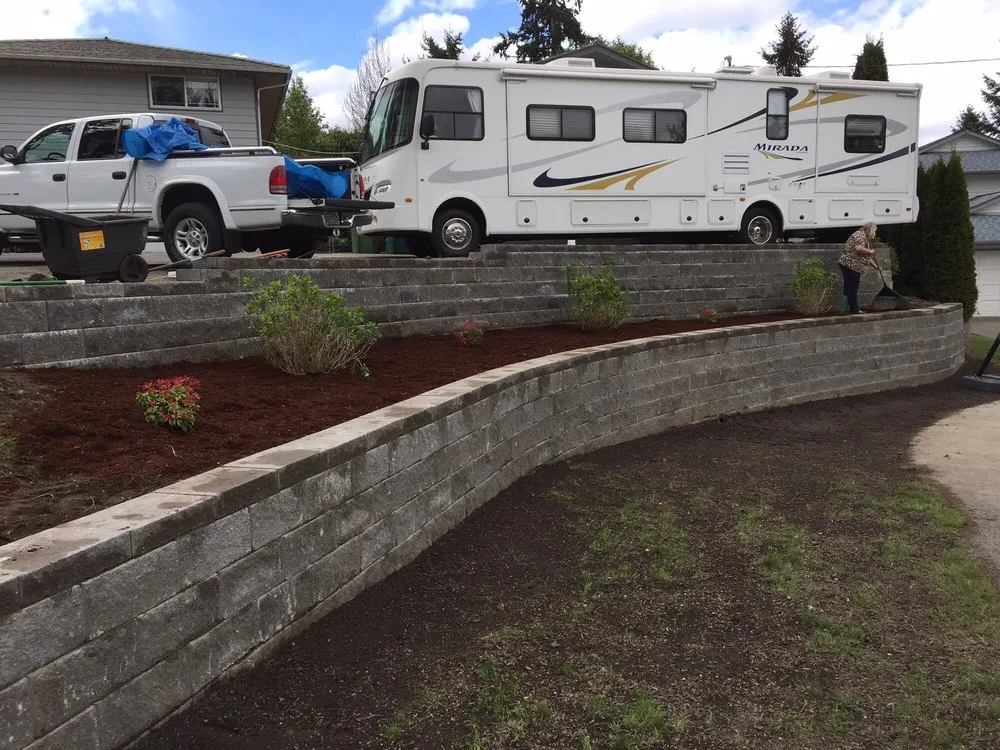 Reliable lawn mowing service for homes in Brier, WA by A & J Retaining Walls
