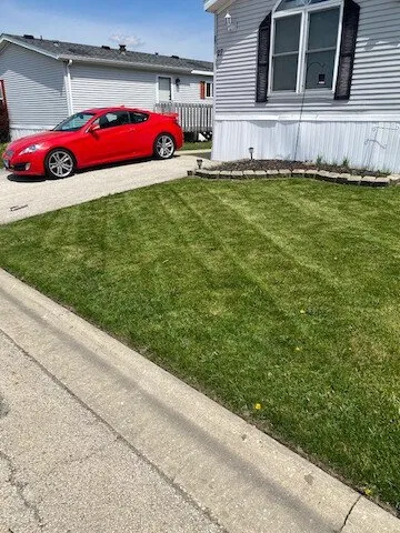 Local lawn care service for year-round maintenance in Bourbonnais, IL by A & J Services