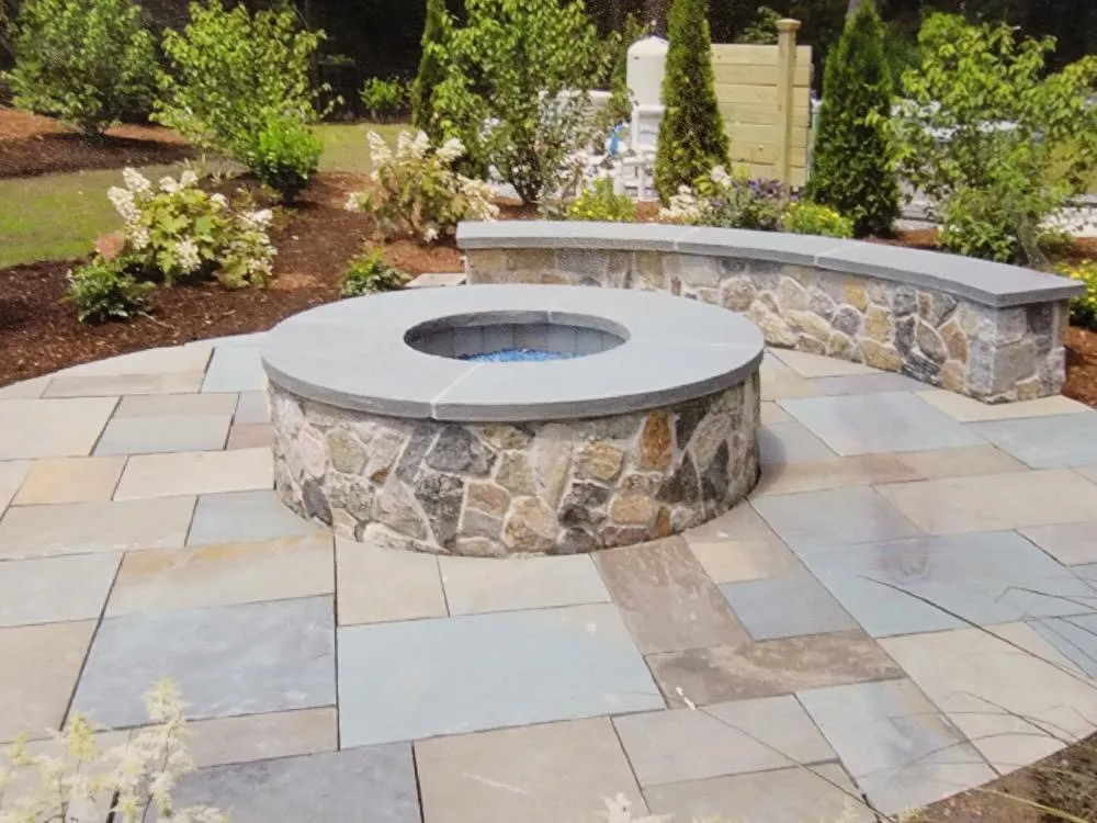 Local lawn mowing service for year-round maintenance across Worcester, MA - A & R Masonry & Landscape Design