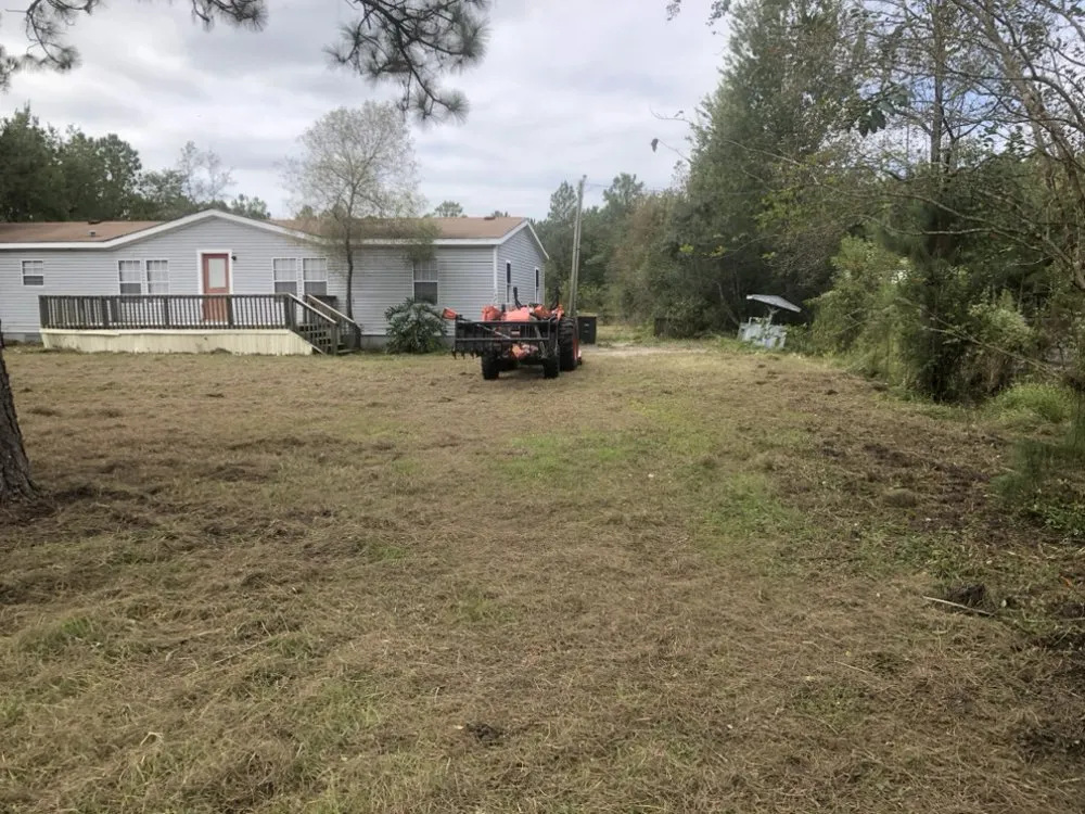 Professional residential landscaping for residential properties in Middleburg, FL by A & S Tractor Work and Woodcrafts