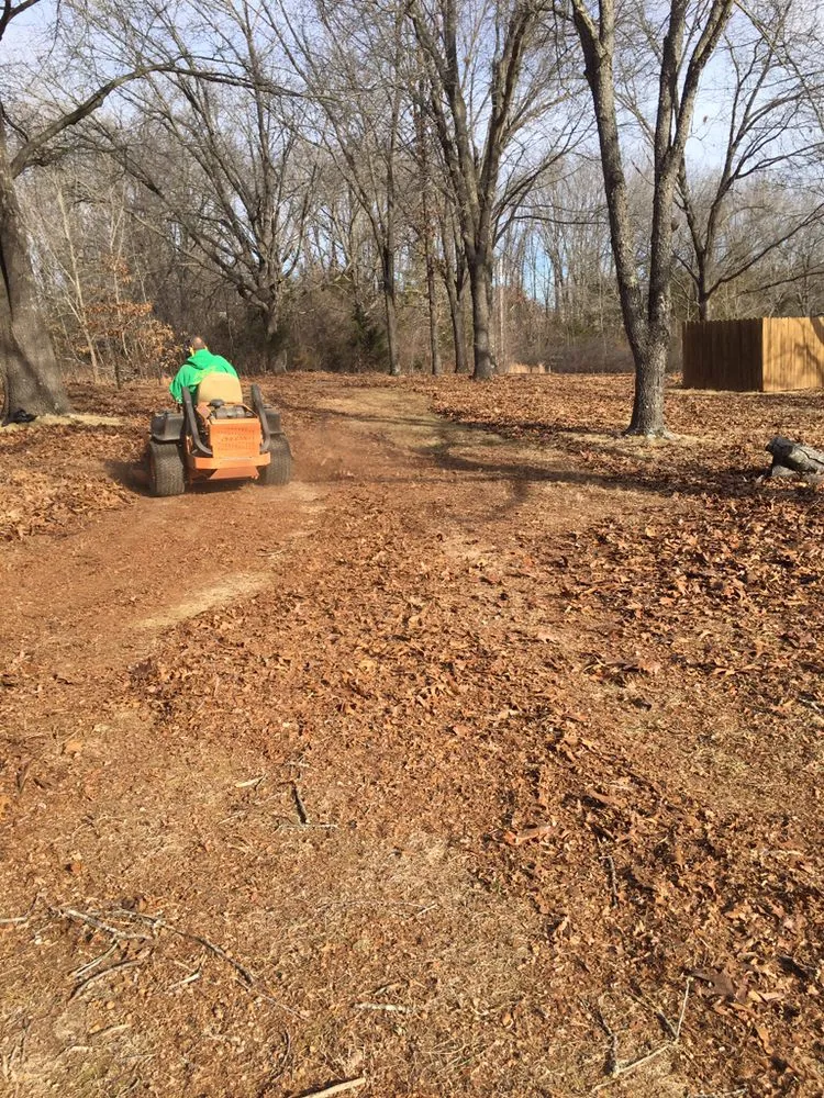 Custom lawn mowing service for residential properties in Ozark, MO by A & T Lawn & Landscape