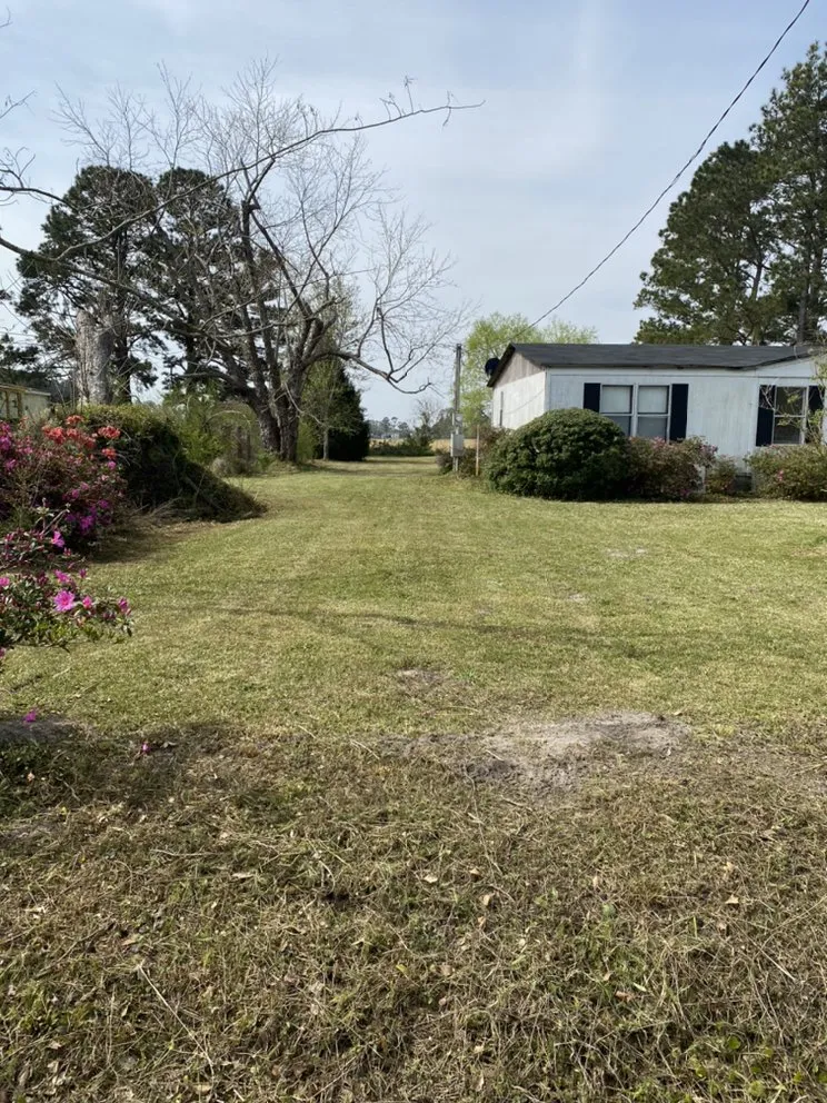 Local lawn mowing service with custom design across Jacksonville, NC - A-1 All Properties Service Landscaping And Lawn Care