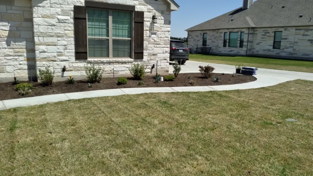 Custom lawn care service with custom design in Liberty Hill, TX by A-Allen Tree and Landscaping Services