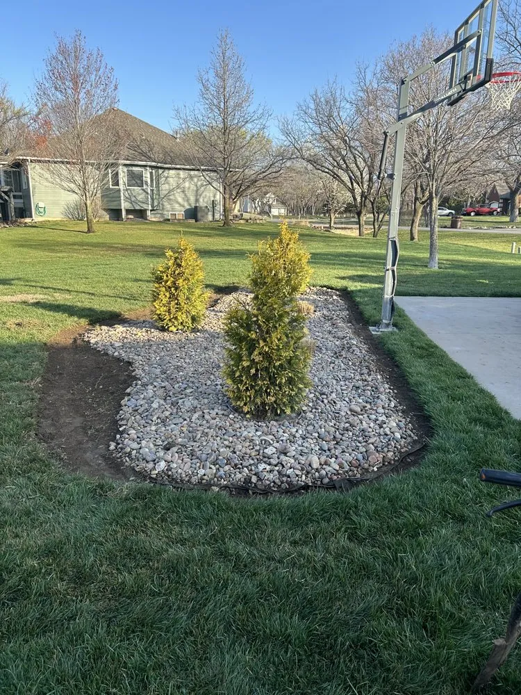 Professional yard maintenance in Valley Center, KS by A and S Borders