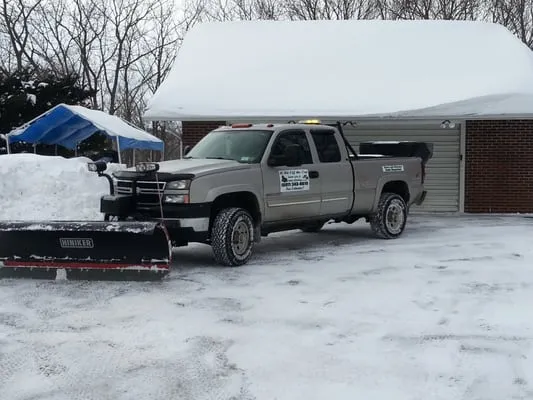 A Bit Off the Top LawnCare & Snow Plowing