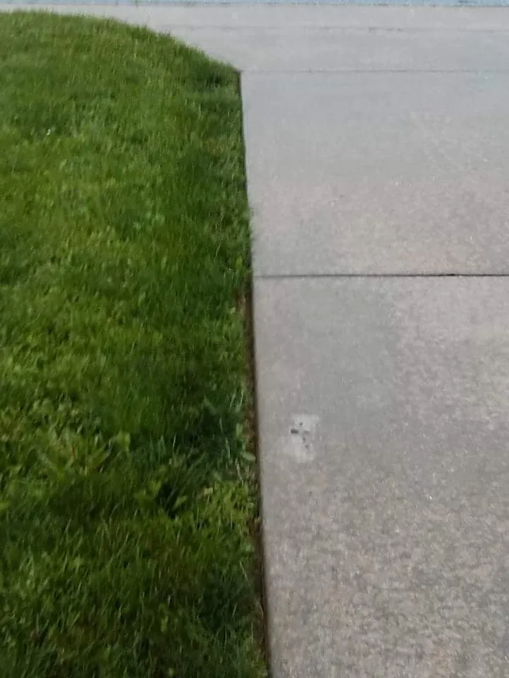 Custom outdoor landscaping with custom design across Ozark, MO - A Blade Above the Rest