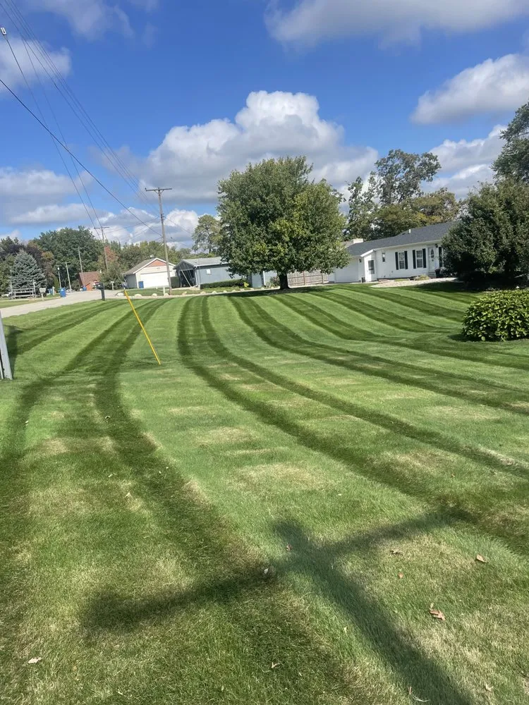 Local garden landscaping in Sand Lake, MI by A C & C Lawn Care & Snow Plowing