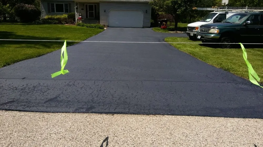 Reliable landscaping services experts serving Woodstock, IL - A Coat Over The top