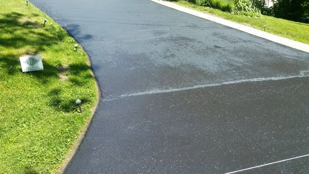 Custom residential landscaping for outdoor upgrades in Woodstock, IL by A Coat Over The top