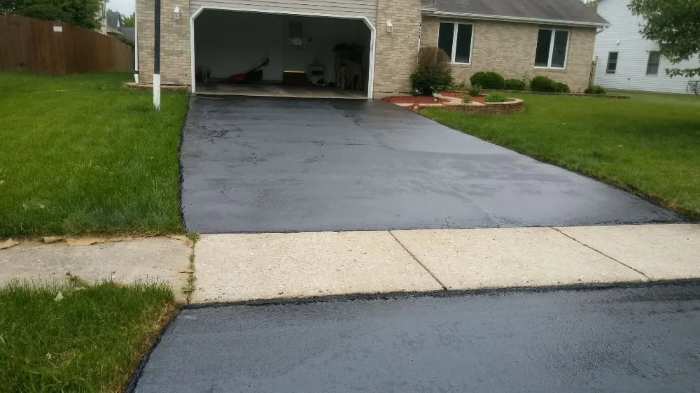 Professional outdoor landscaping experts serving Woodstock, IL - A Coat Over The top