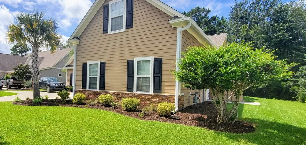 Local yard cleanup service for year-round maintenance across Huntersville, NC - A Cut Above Landscaping