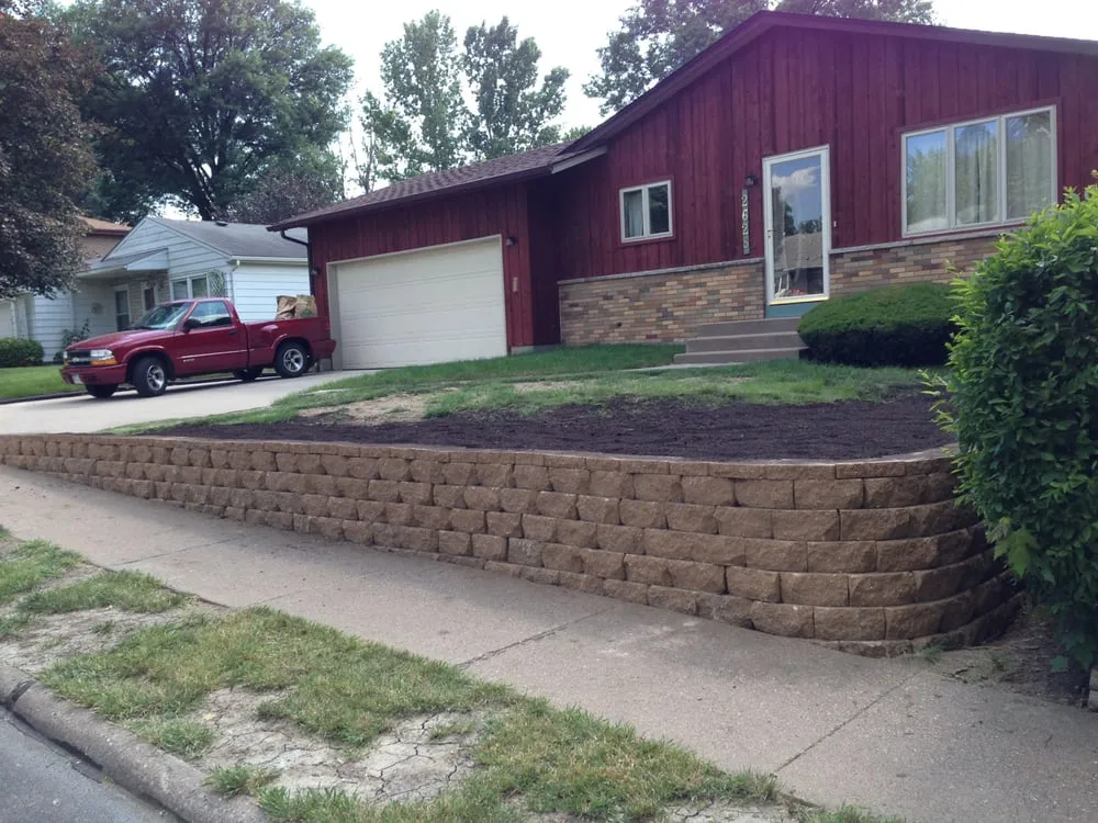 Affordable outdoor landscaping for beautiful yards in Davenport, IA by A Cut Above Lawn and Landscape