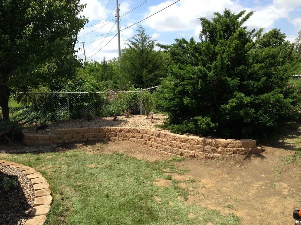 Custom yard cleanup service for outdoor upgrades across Davenport, IA - A Cut Above Lawn and Landscape