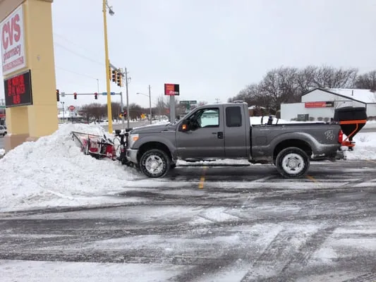 A Cut Above Lawn and Landscape Logo