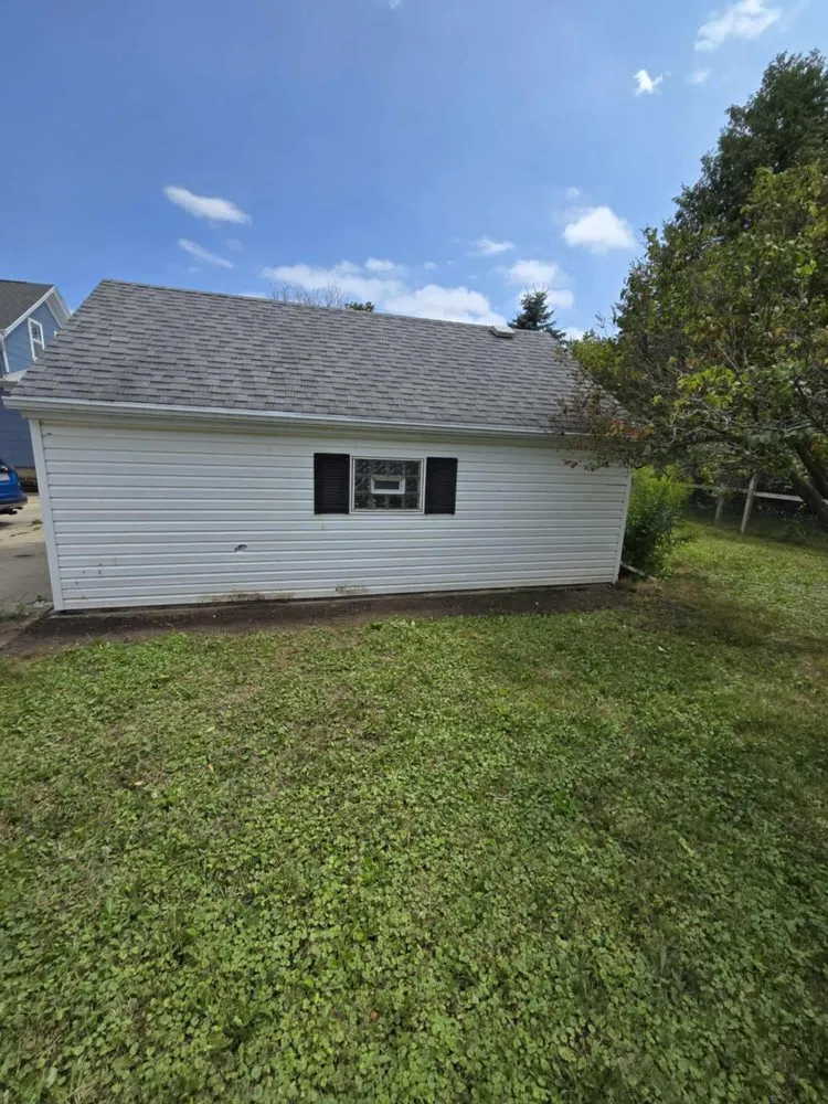 Custom landscape design in Manitowoc, WI by A Cut Above Lawn Care