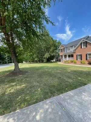 A Cut Above Lawn Care Logo