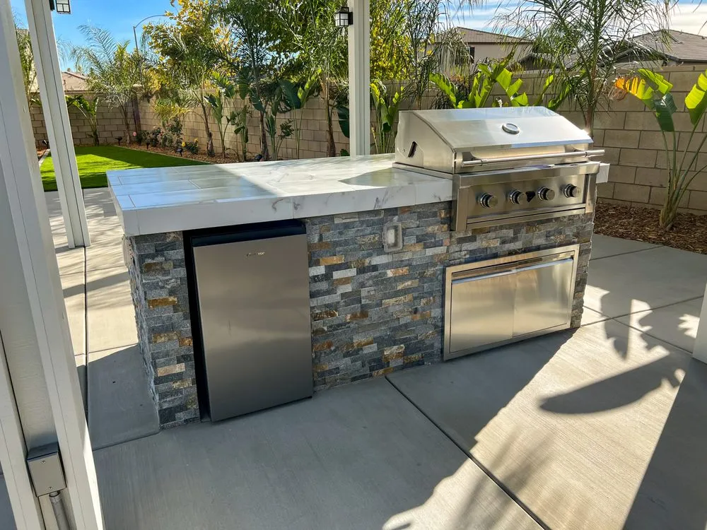 Custom outdoor landscaping in Menifee, CA by A Cut Above Pools