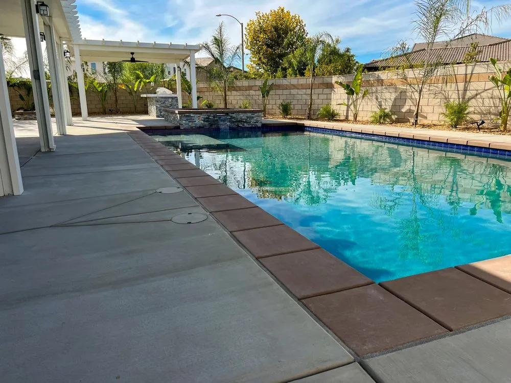 Professional yard cleanup service for outdoor upgrades in Menifee, CA by A Cut Above Pools