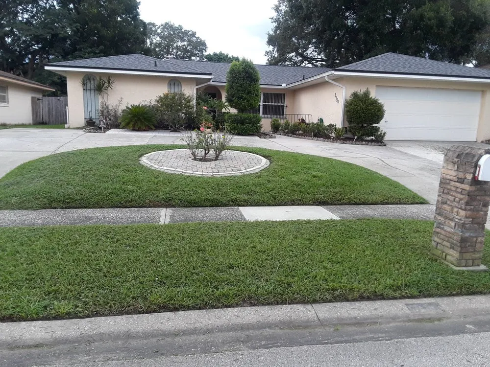 Custom yard maintenance with custom design in Orlando, FL by A Groomer Lawn & Tree Enterprise