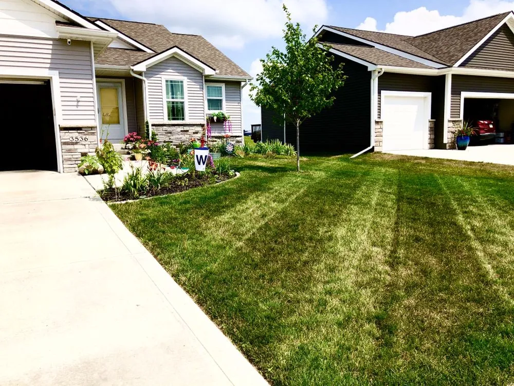 Affordable landscape design in Ankeny, IA by A Guy And A Mower