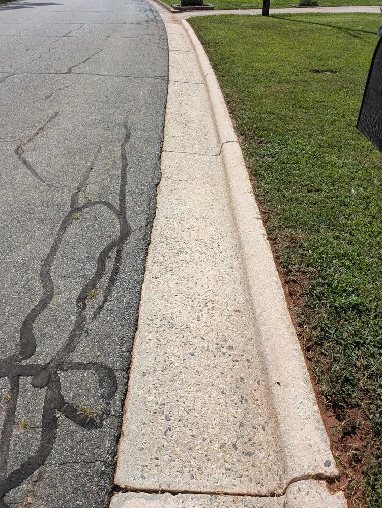 Custom outdoor landscaping in Burlington, NC - A Helping Hand Pressure Washing and Lawn Care Services.