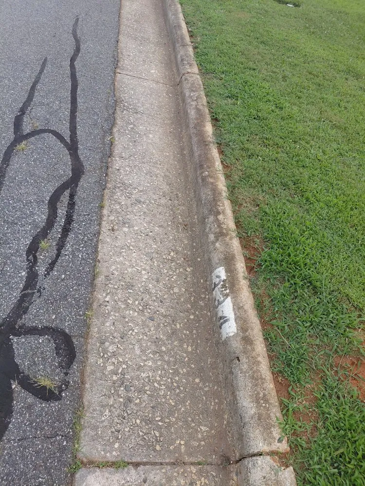 Expert landscaping services in Burlington, NC by A Helping Hand Pressure Washing and Lawn Care Services.