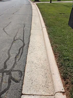 A Helping Hand Pressure Washing and Lawn Care Services. Logo