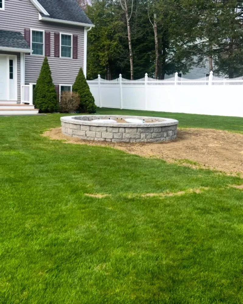 Expert lawn mowing service for year-round maintenance in Biddeford, ME by A+ Landscaping