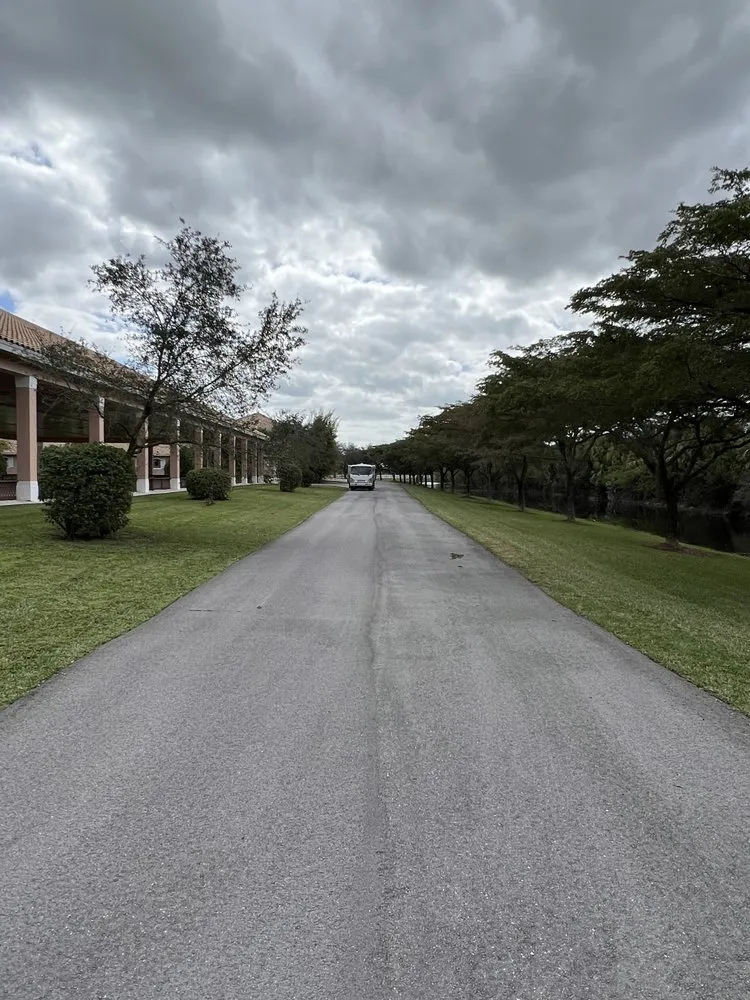 Custom landscape design for year-round maintenance in Boynton Beach, FL by A Martinez Lawn Care & Landscaping Services