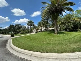 Custom lawn mowing service with custom design across Deltona, FL - A. Nieves lawn maintenance and Dumpster rental