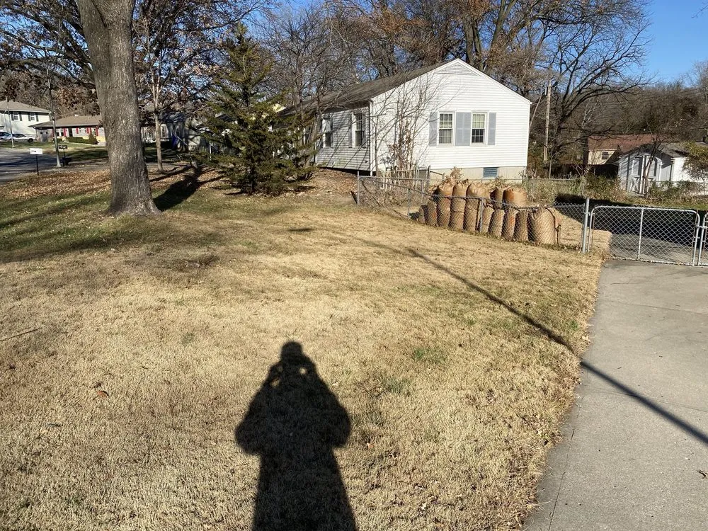 Professional yard cleanup service in Kansas City, MO by A-One Lawncare