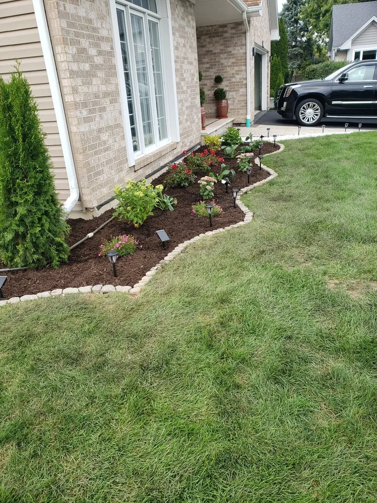 Professional lawn care service for residential properties in McHenry, IL by A P Landscaping & Design