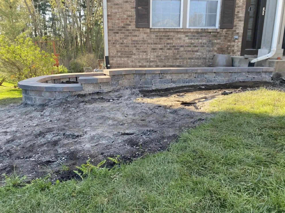 Custom landscape installation for residential properties in Mendota, IL by A Quest Landscape