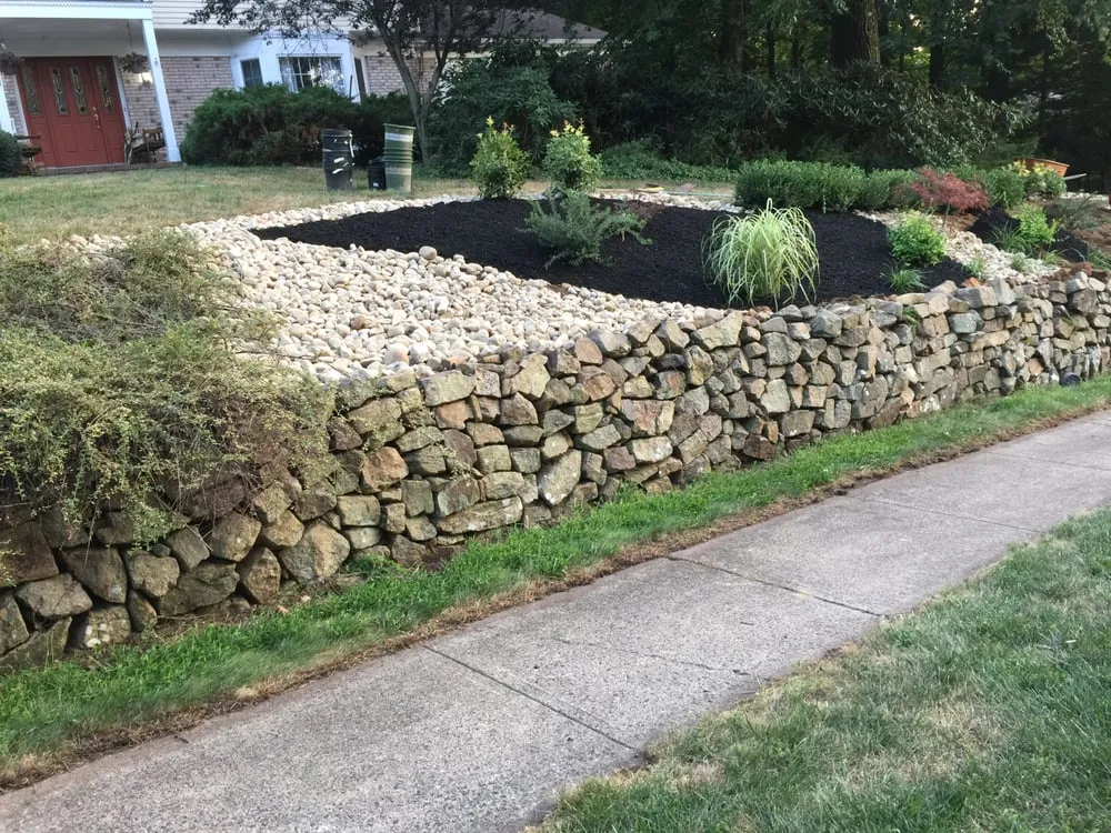 Professional yard cleanup service for homes in Randolph, NJ by A Quick Cut Landscaping